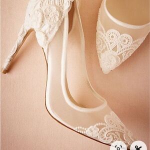 Vince Camuto size 8 white lace heels. Wore on my wedding day for a few hours
